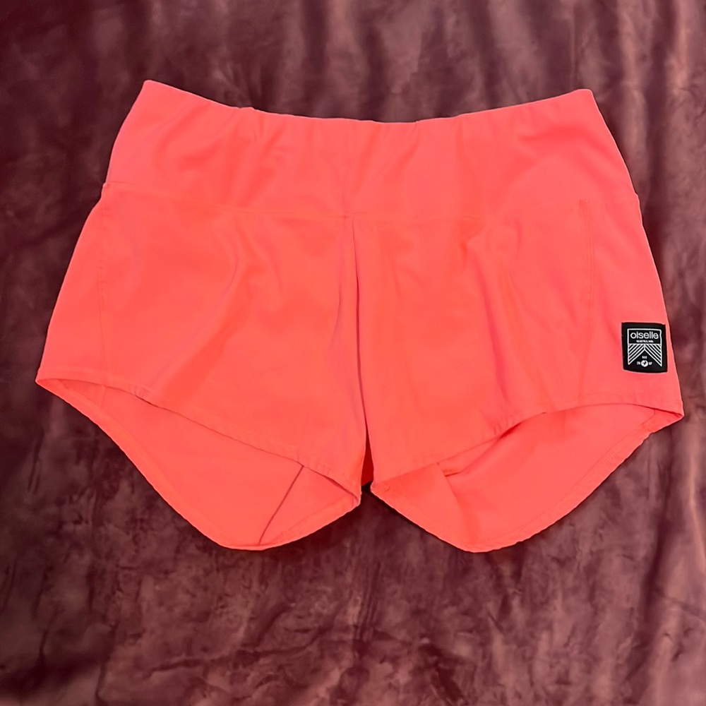 Oiselle women’s running short - neon pink/coral